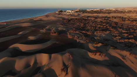 low altitude drone flight over sandy beach