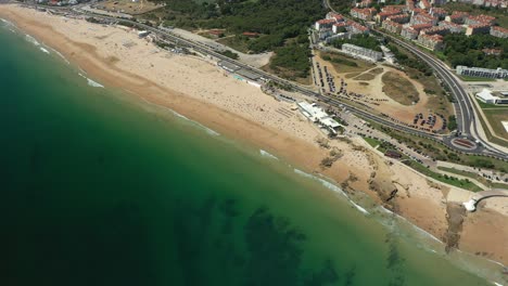Aerial Vertical Drone View of a city beach, near Lisbon, Portugal