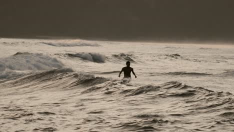 View-on-the-reef-and-the-waves-of-Seger,-near-Kuta-Lombok,-during-sunset