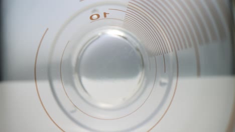 inside a measuring cup with numerical markings