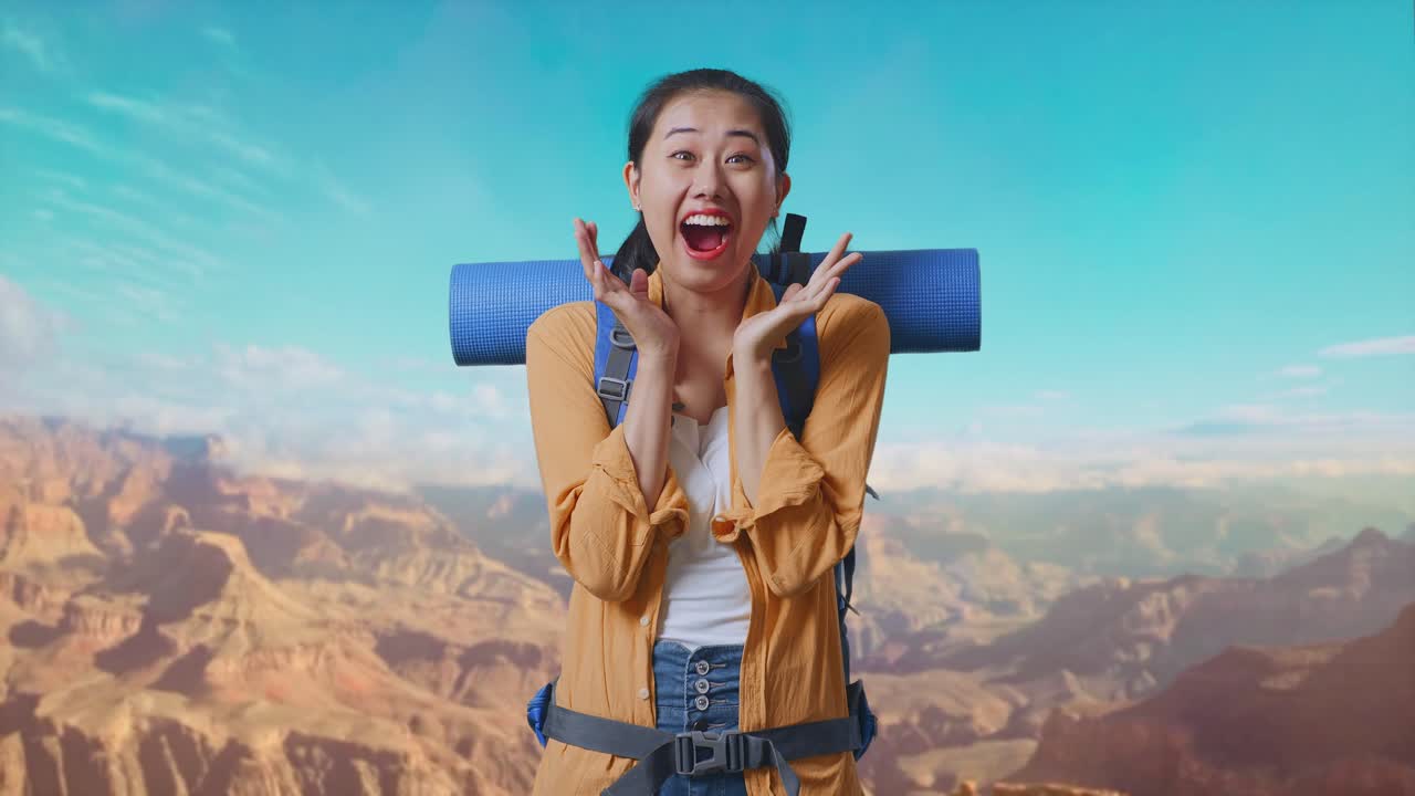 Asian Female Hiker With Mountaineering Backpack Saying Wow While Traveling At The Top Of Mountain