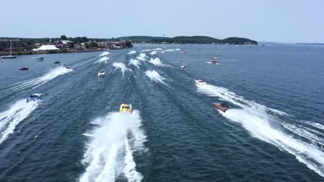 cigarette boats in poker run race - go-fast power boat racing - aerial drone view in hd and 4k