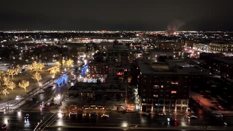 salt lake city, utah por la noche con luces de navidad y el horizonte - panorama aéreo