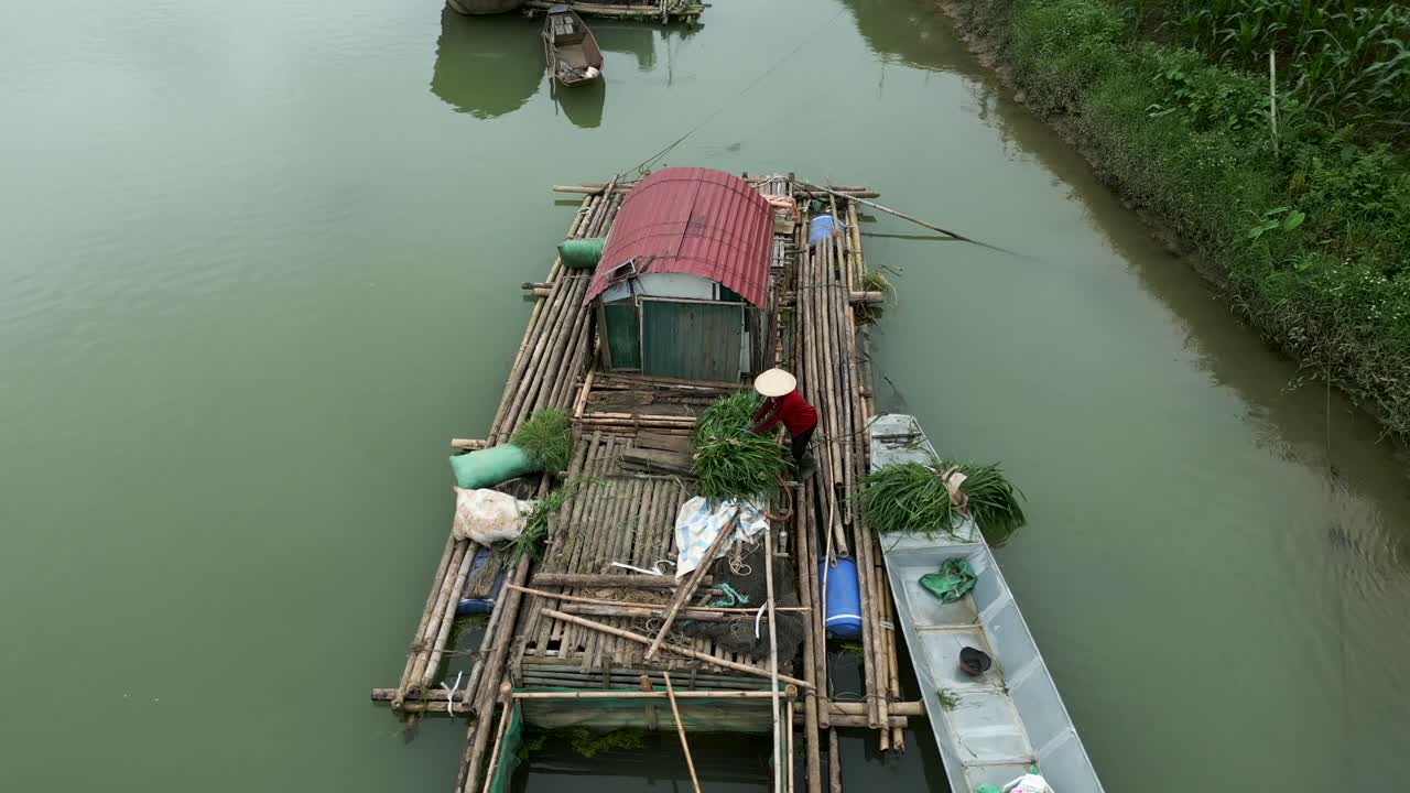 Floating Houses and Boats on a River