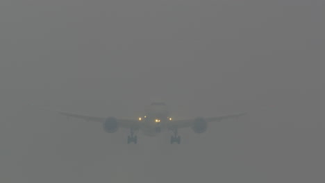 airplane landing in dense fog