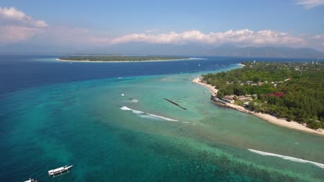 Aerial-view-of-drone-flying-over-gili-trawangan-towards-gili-meno,-lombok,-bali,-indonesia