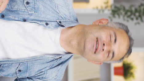 Vertical-video-of-Happy-man-dancing.