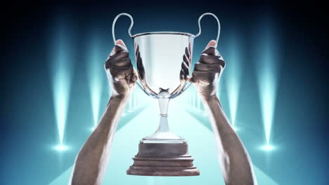 hands holding silver trophy video