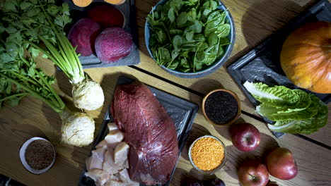 selection of gourmet meat and vegetables cooking ingredients on table