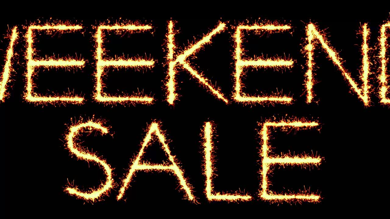 Weekend sale text sparkler writing with glitter sparks particles firework on black 4k loop
