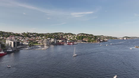 fly over peaceful sea at the coastal town of arendal in agder county, norway