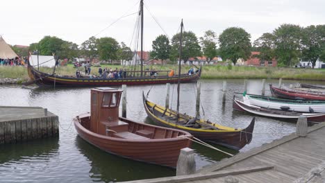 viking ships and boats at a harbor