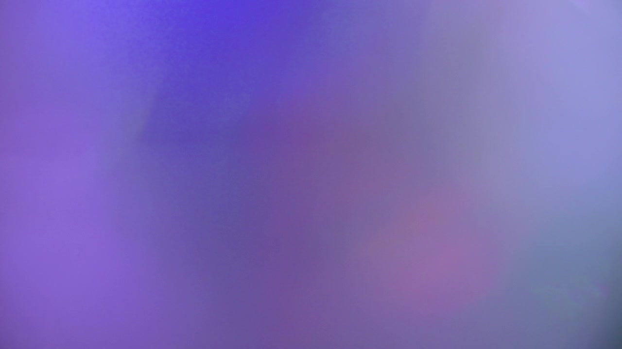 Fundo Abstrato com Vazamentos de Luz Coloridos em Movimento e Bokeh