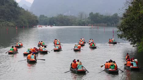 groups of rowers in a synchronized rowing race