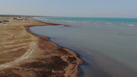 aerial-view-along-the-shore-of-the-Karavasta-lagoon-in-Albania-and-on-a-sunny-day