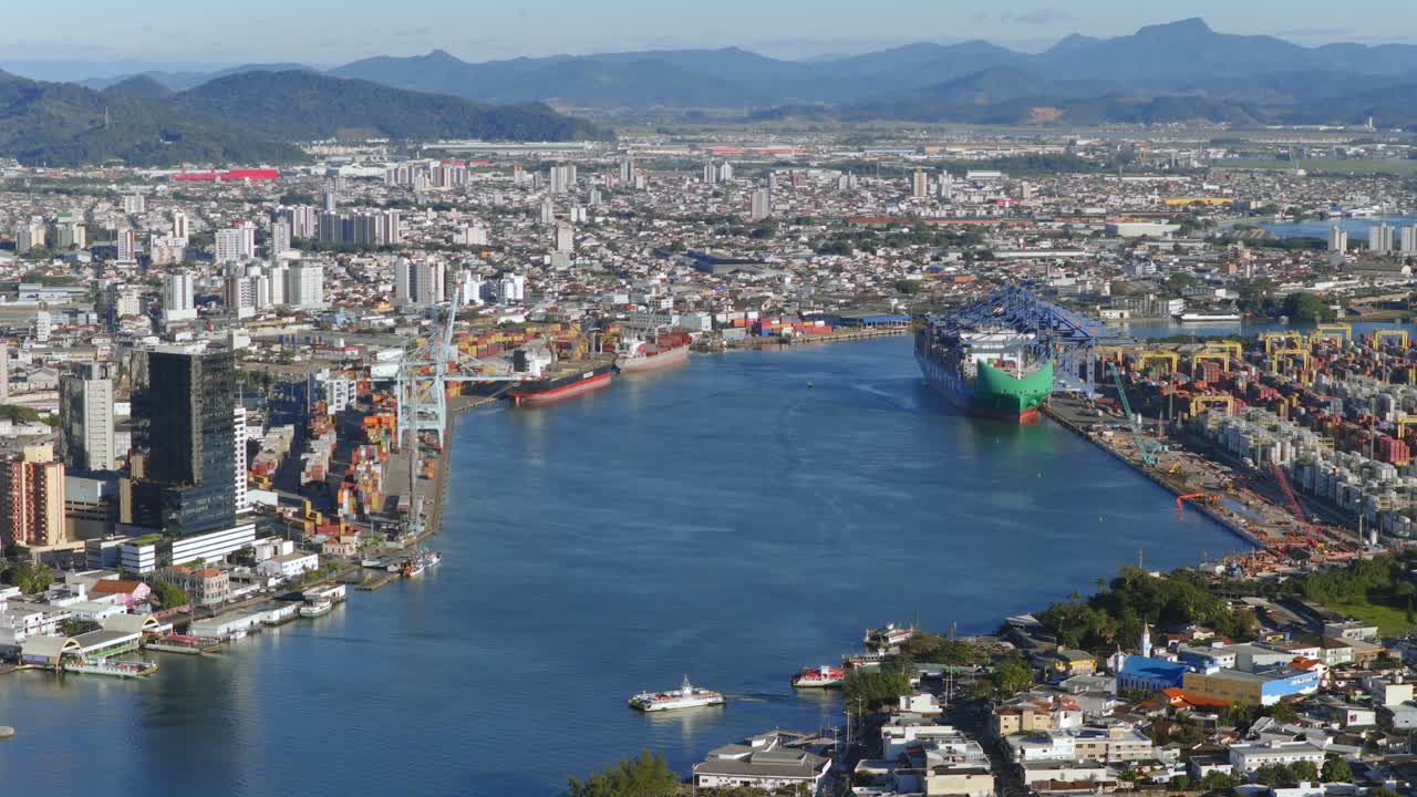 Aerial view of large cargo ship in port of Itajai, Brazil, trade, export, investment growth