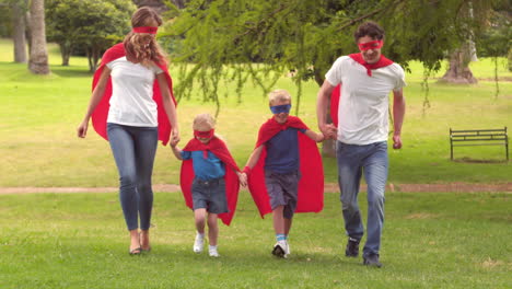 family pretending to be superhero