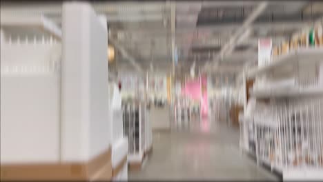 blurred motion through a busy retail aisle