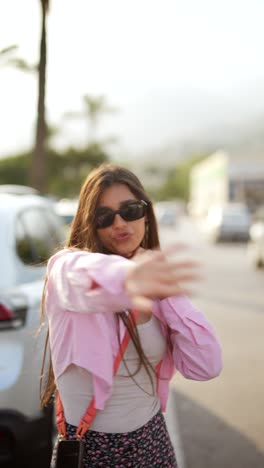 stylish woman in pink outfit