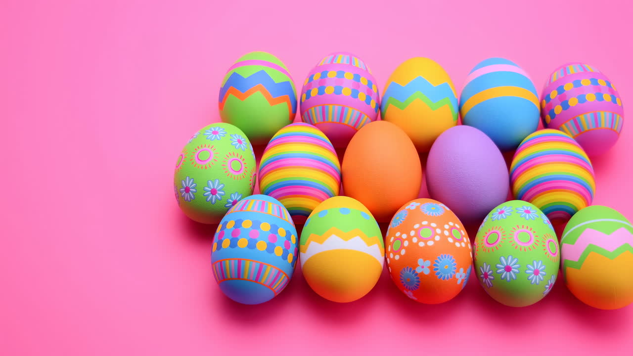 Colorful Decorated Easter Eggs on Pink Background