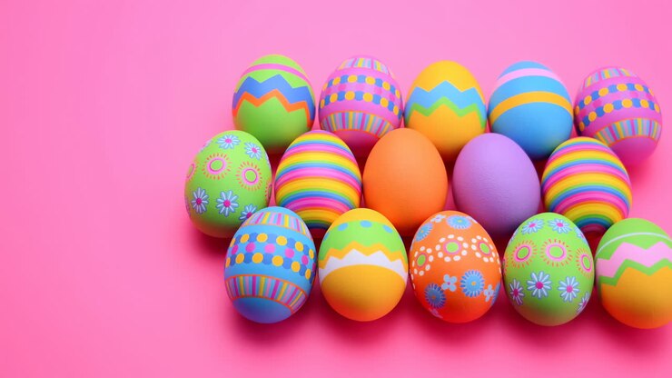 Colorful Decorated Easter Eggs on Pink Background