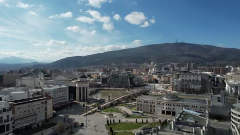 Aerial-view-of-the-city-center-square-in-Macedonia,-buildings-and-representative-structures-in-the-center