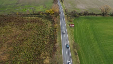 a car overtakes another car on asphalt road