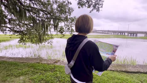 tourist looks at map in beaufort sc, south carolina