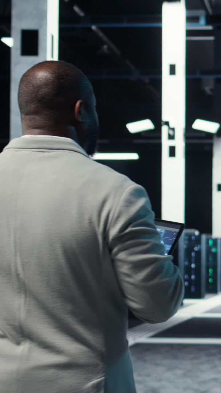 Vertical video Server room software developer troubleshooting errors using software