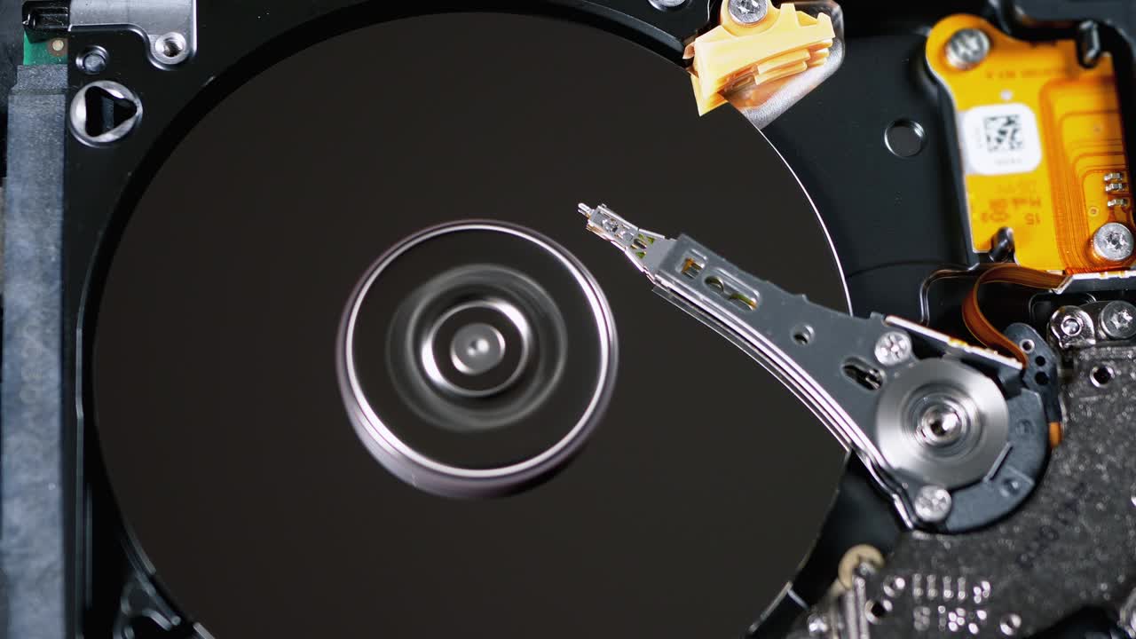 Hard Disk Drive Inside. Structure of HDD, Spinning Platter. Move magnetic head