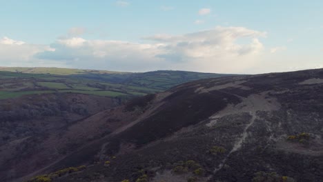 Aerial-North-Devon-Moorland-with-Green-Fields-at-Sunset