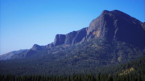 majestic mountain landscape under a clear blue sky at midday