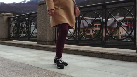 woman walking on a city street