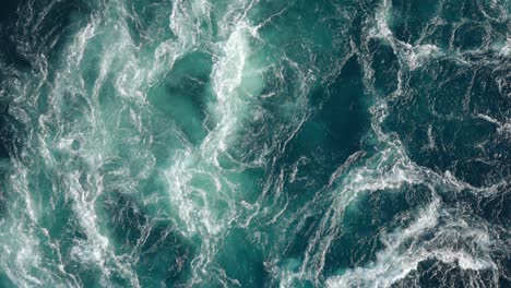 Blue-waves-of-water-of-the-river-and-the-sea-meet-each-other-during-high-tide-and-low-tide.