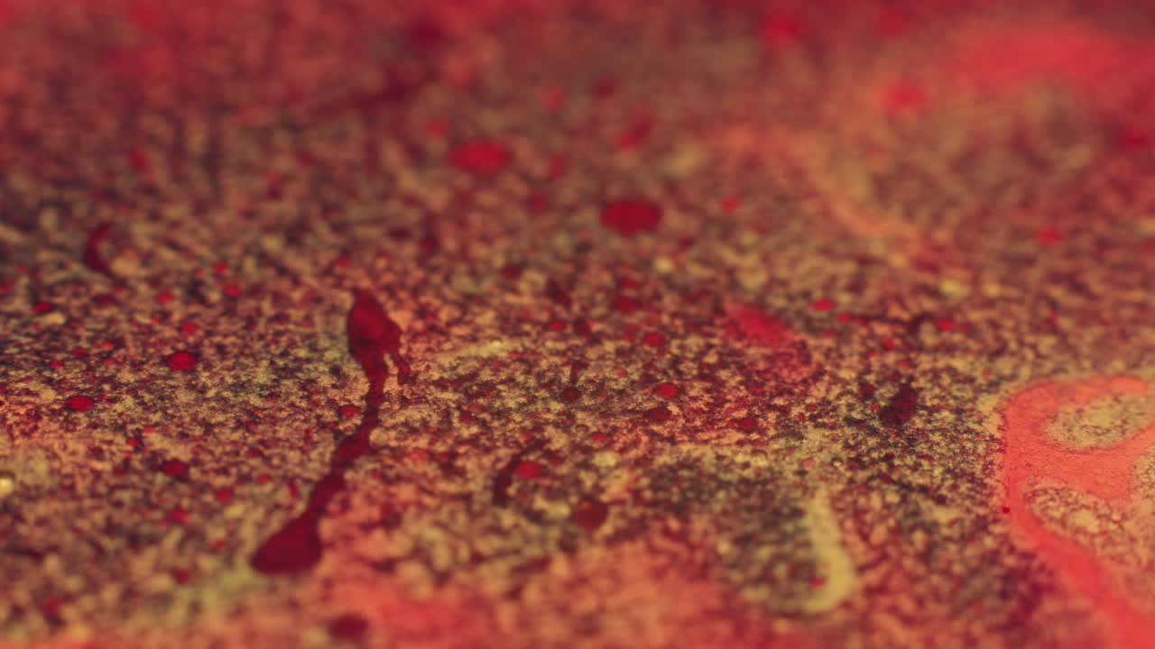 Colourful, organic, liquids macro shots buzzing and flowing