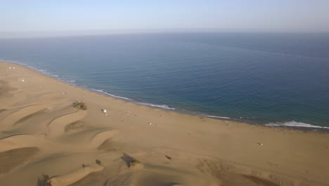 Flying-over-the-coast-and-blue-ocean