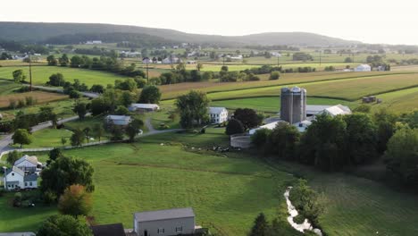 Countryside-aerial-reveals-farming-community-in-Pennsylvania,-United-States,-USA