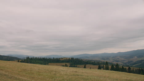 mountain landscape under cloudy sky