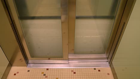 pov in an elevator going up.