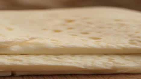 close-up of slices of white cheese