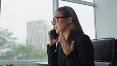 successful businesswoman making call resolve business problems remotely closeup