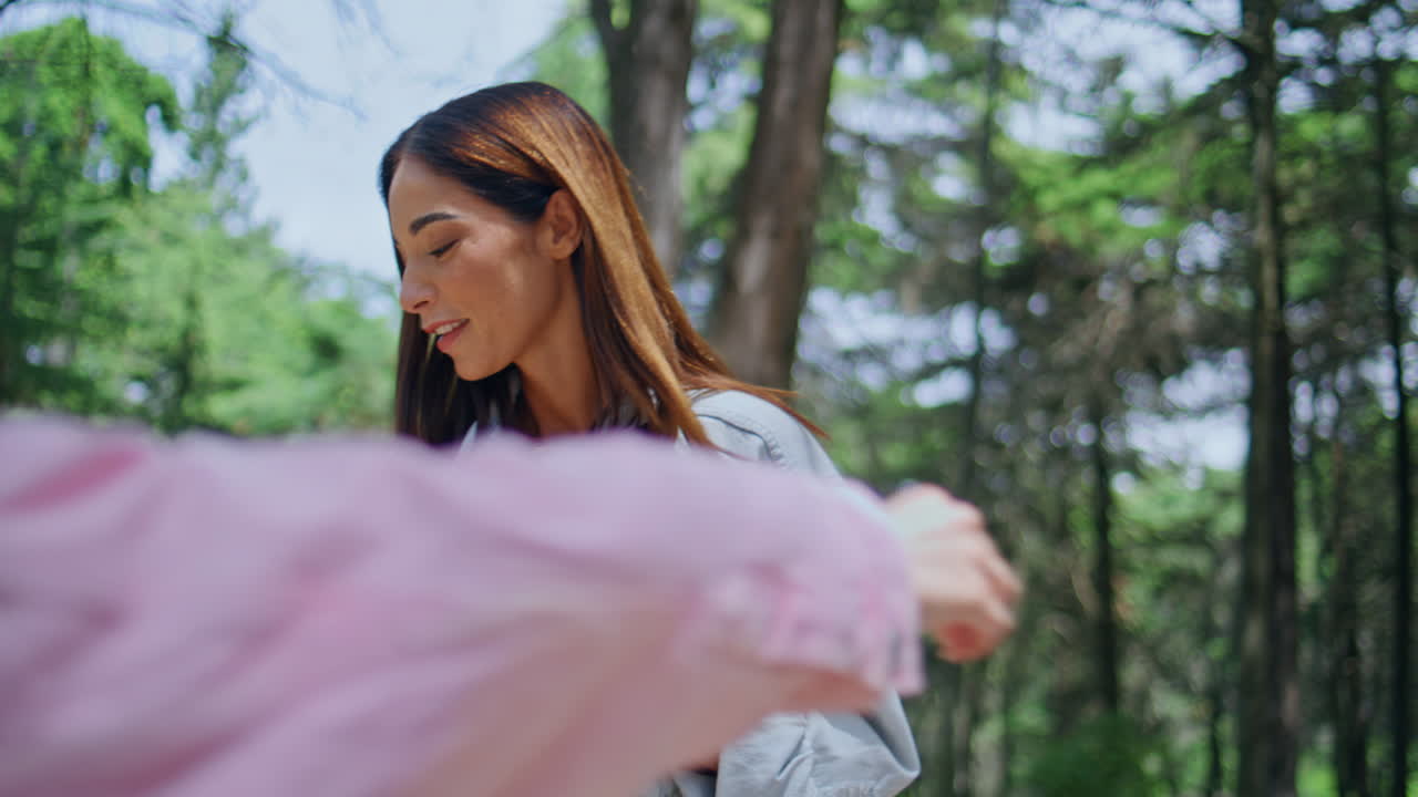Woman seasoning picnic vegetables cooking in forest closeup. Girl preparing food