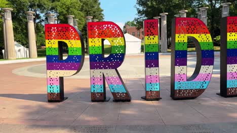 large art sign for pride fest in nashville at a neighborhood park displaying unity for lgbtq rights in america