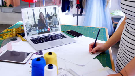 female designer having a video conference