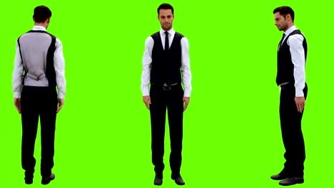 Young businessman quickly bows politely on a green screen background. Looped animation. 4k
