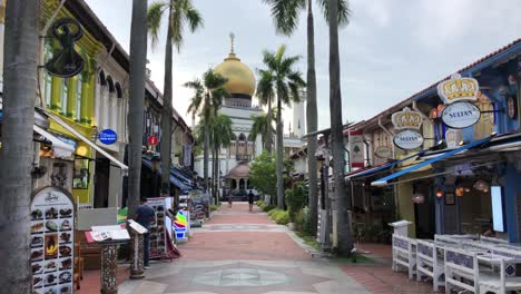 pedestrian street with sultan mosque, masjid sultan, on background, singapore