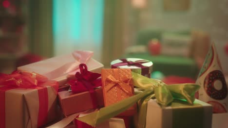 pile of wrapped birthday gifts