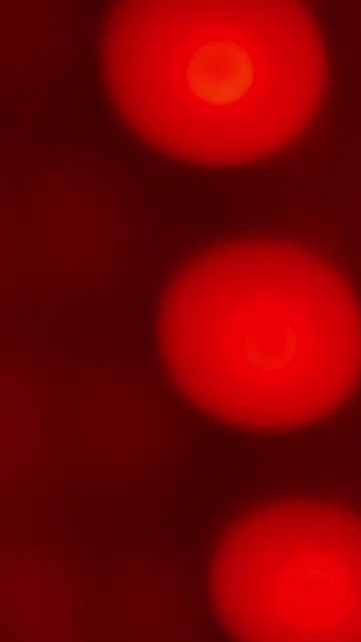 Loop continuo di luci sfocate vibranti con cambio di colore