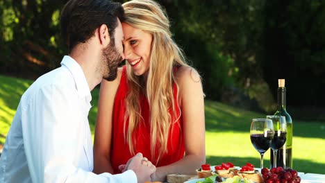Couple-romancing-in-outdoor-restaurant-4k