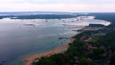 Traditional-Jukung-Fishing-Boats-At-Mertasari-Beach-In-The-Seaside-Town-Of-Sanur,-Bali-Island,-Indonesia